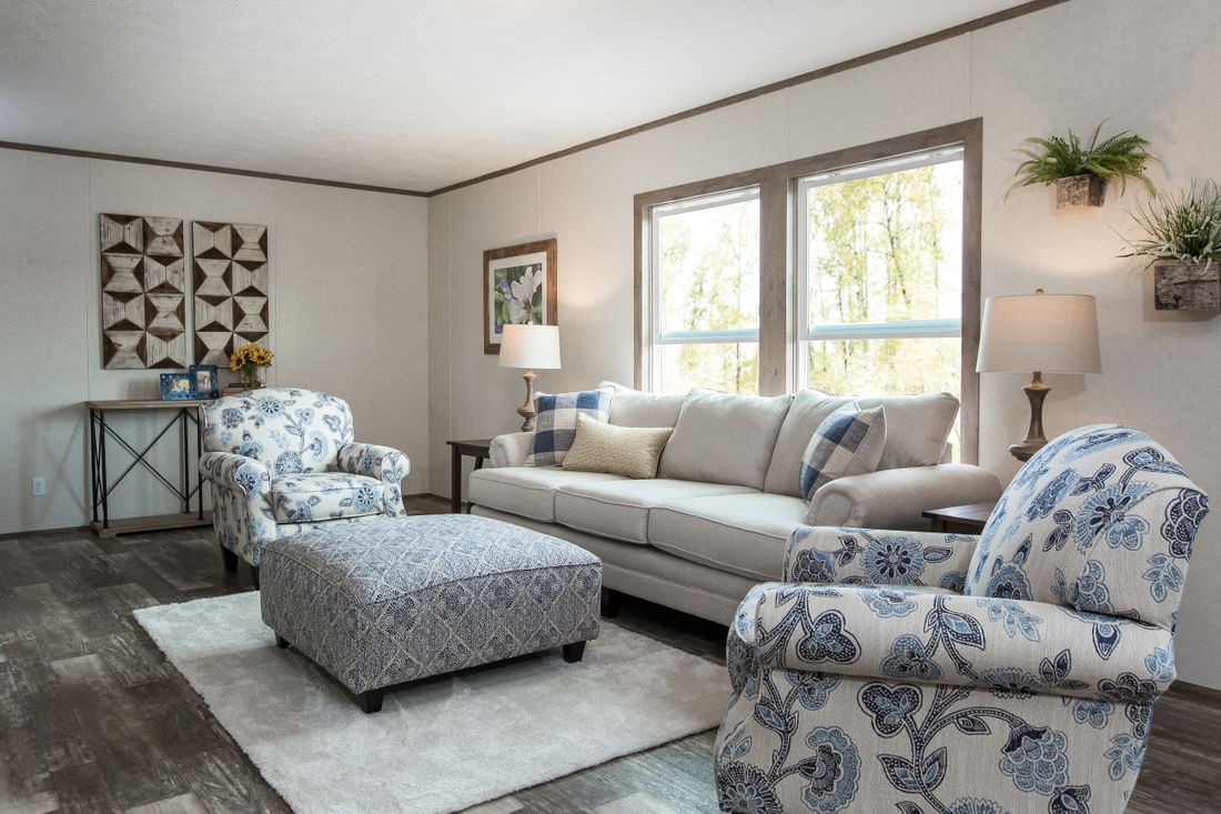 The THE BREEZE II Family Room. This Manufactured Mobile Home features 4 bedrooms and 2 baths.