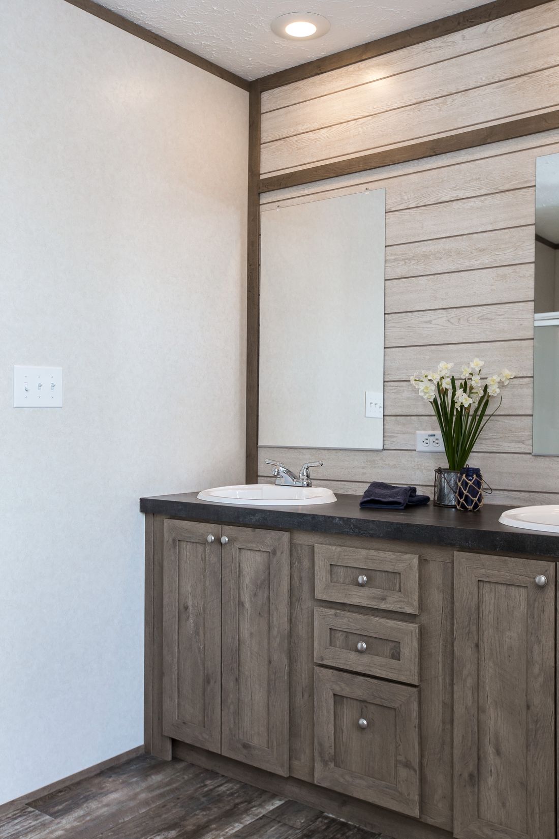 The THE BREEZE II Master Bathroom. This Manufactured Mobile Home features 4 bedrooms and 2 baths.