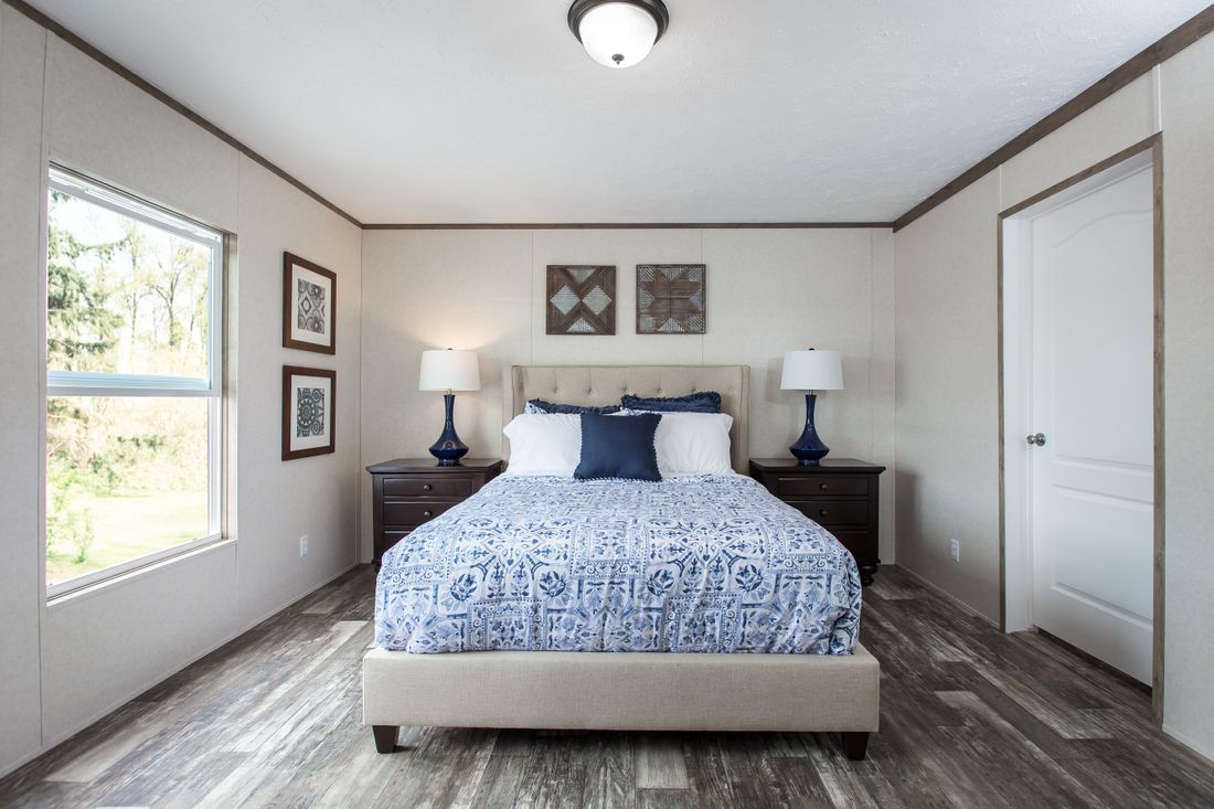 The THE BREEZE II Master Bedroom. This Manufactured Mobile Home features 4 bedrooms and 2 baths.