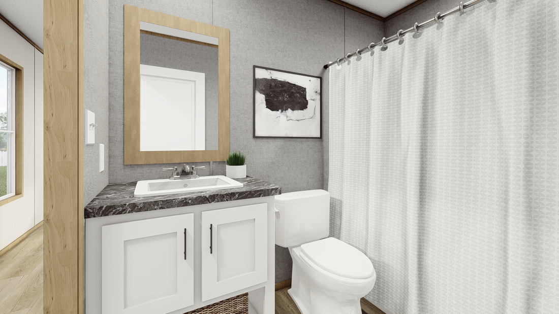 The LEWIS   16X56 Guest Bathroom. This Manufactured Mobile Home features 2 bedrooms and 2 baths.