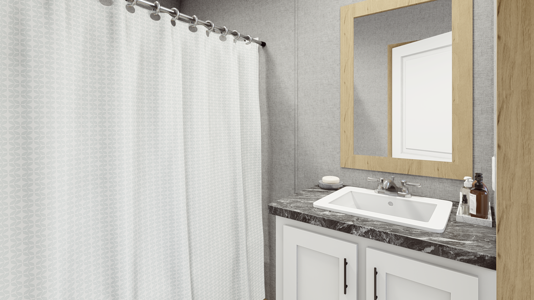 The LEWIS   16X56 Master Bathroom. This Manufactured Mobile Home features 2 bedrooms and 2 baths.
