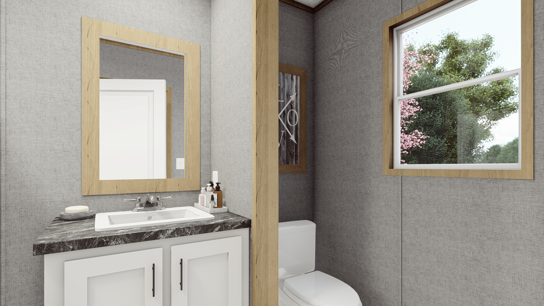 The LEWIS   16X56 Master Bathroom. This Manufactured Mobile Home features 2 bedrooms and 2 baths.